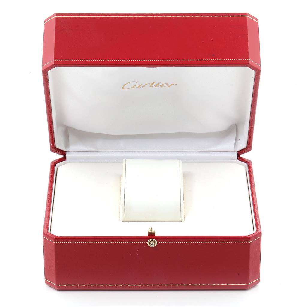 This image shows an open red Cartier presentation box for the Tank Anglaise model watch, with an empty cushioned holder inside.