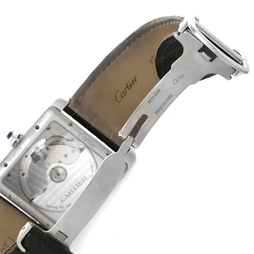 The image shows the back and clasp of the Cartier Tank MC W5330003 Men's Stainless Steel Silver Dial W5330003 Men's Stainless Steel Silver Dial watch, highlighting the movement and the "Swiss Made" markings.