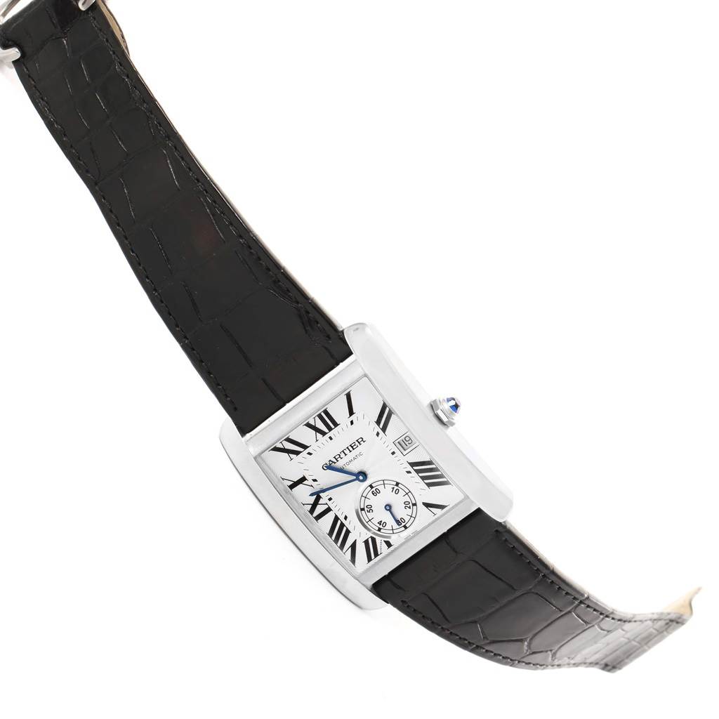 The image shows the Cartier Tank MC W5330003 Men's Stainless Steel Silver Dial W5330003 Men's Stainless Steel Silver Dial watch from a top angle, displaying the dial, case, and leather strap.