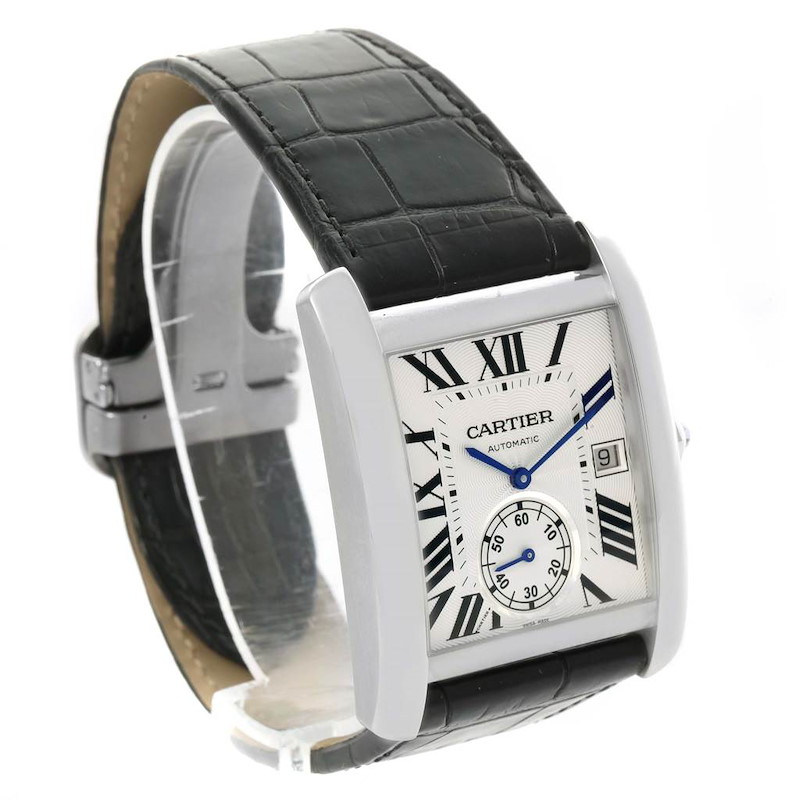 The image shows a Cartier Tank MC watch at an angle highlighting its dial, case, and black leather strap.