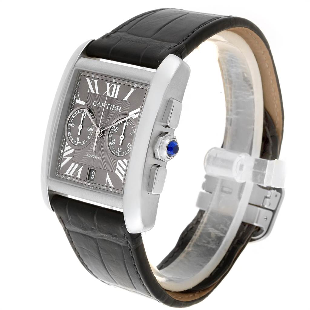 The image shows a Cartier Tank MC W5330008 Men's Stainless Steel Grey Dial W5330008 Men's Stainless Steel Grey Dial watch from a side angle, displaying the dial, bezel, strap, and crown with a blue cabochon.