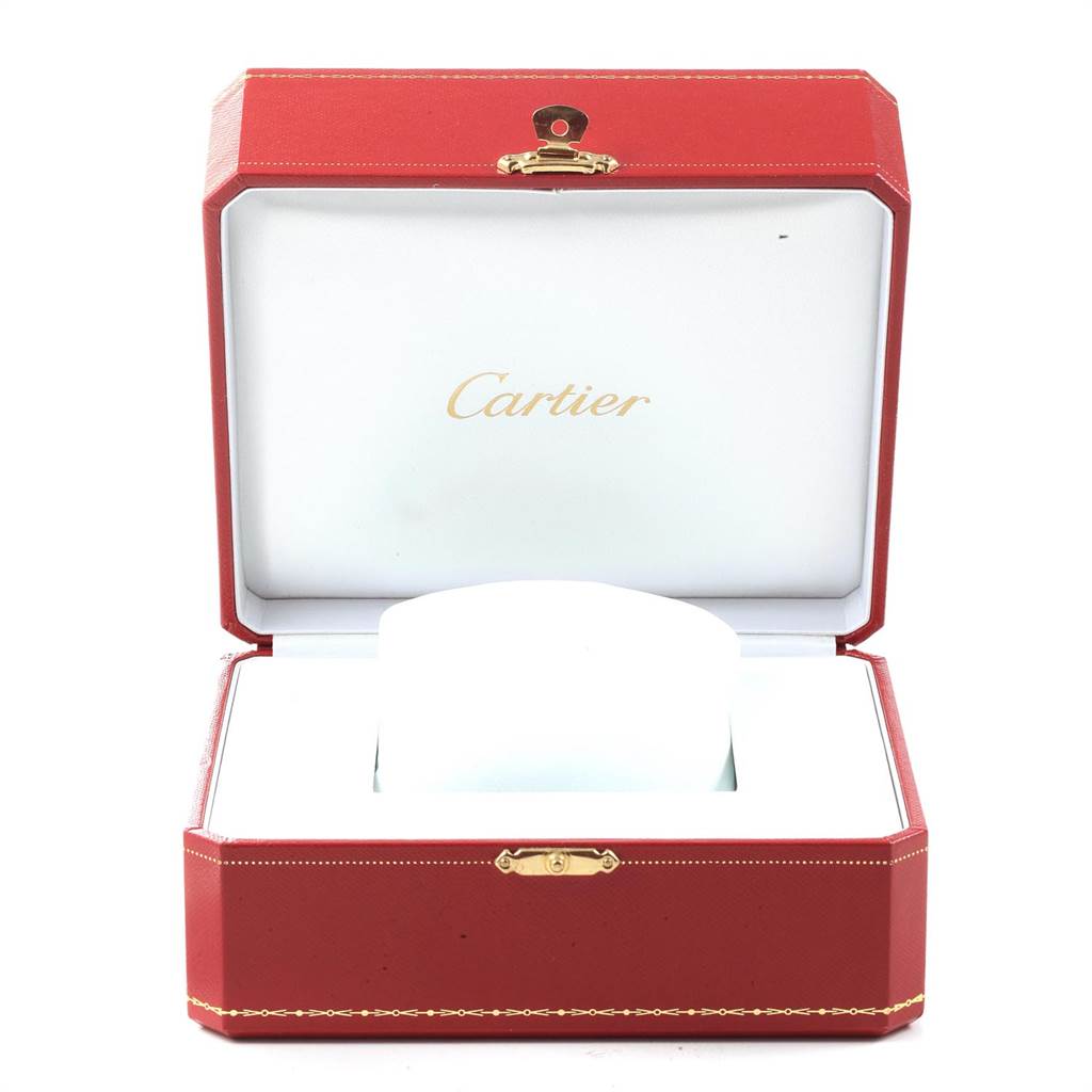 The image shows an open red and gold Cartier box designed to hold the Tank MC model watch by Cartier.