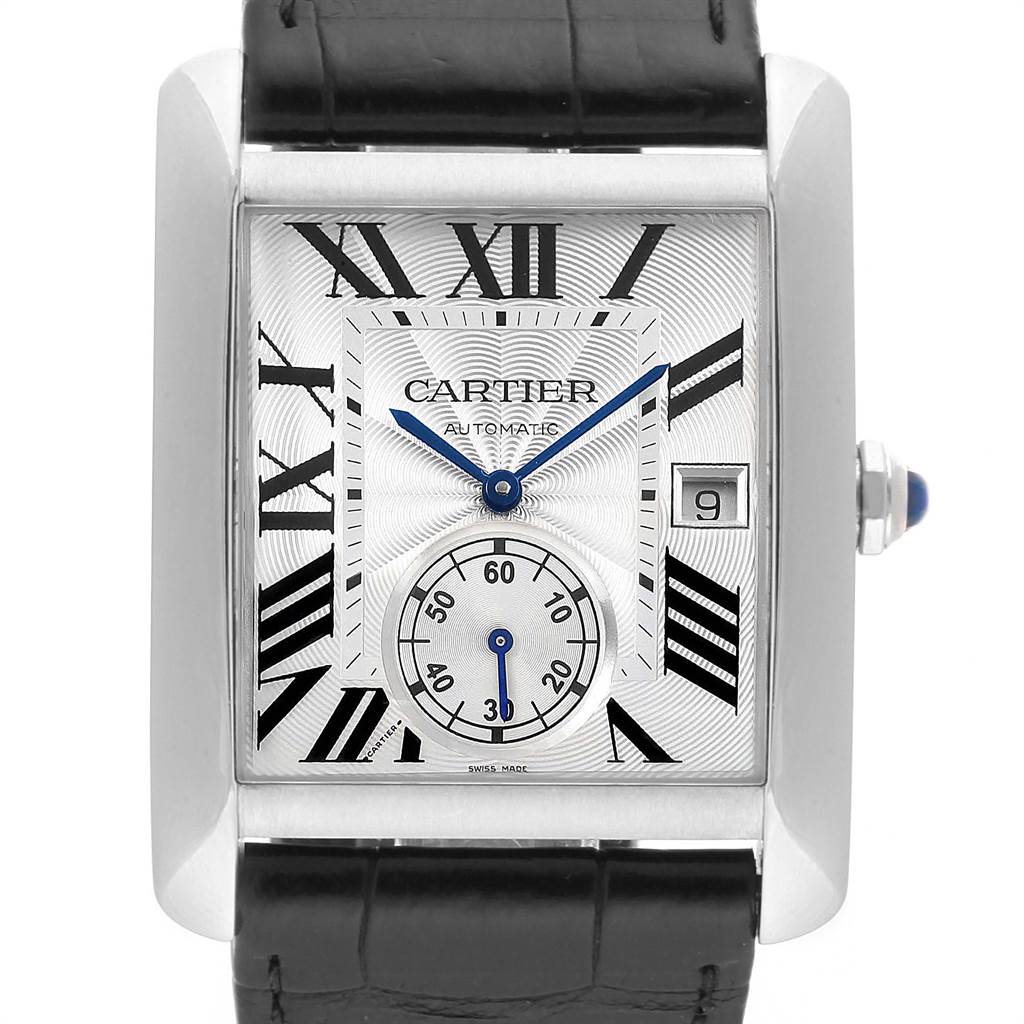 The Cartier Tank MC W5330003 Men's Stainless Steel Silver Dial W5330003 Men's Stainless Steel Silver Dial watch is shown from a front angle, displaying its dial, date window, hands, and part of the strap.