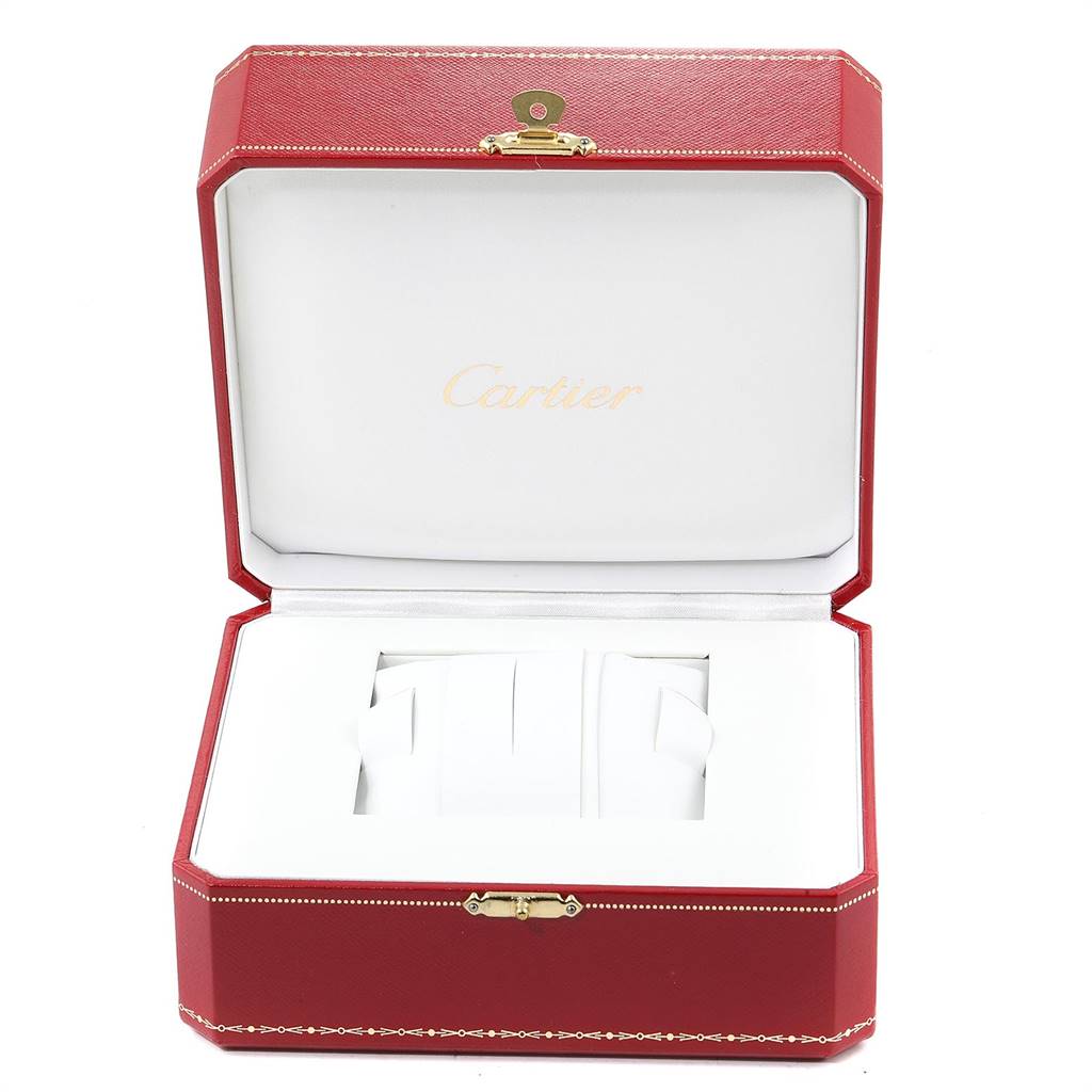 The image shows an open red Cartier box for the Tank MC model watch.