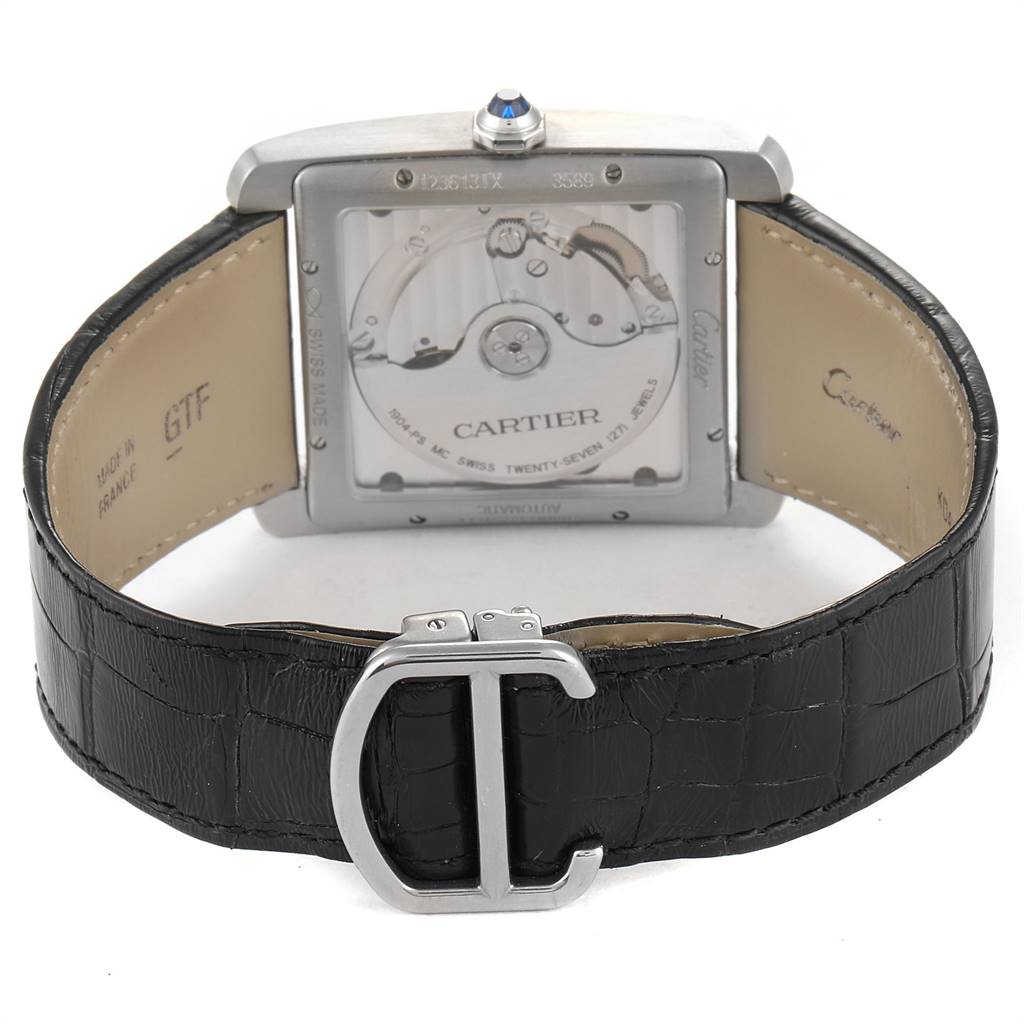 The image shows the back view of a Cartier Tank MC W5330003 Men's Stainless Steel Silver Dial W5330003 Men's Stainless Steel Silver Dial watch, highlighting the movement and black leather strap.