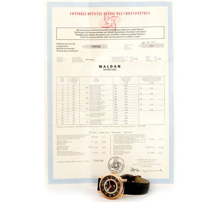 The Waldan Men's Rose Gold Black Dial Men's Rose Gold Black Dial Astronic Triple Date Moonphase 18K Rose Gold Watch is shown from the front and placed in front of its COSC certification.