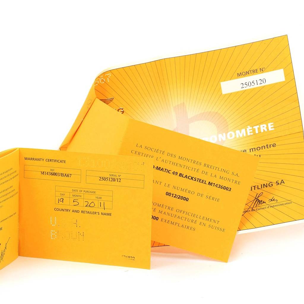 The image shows the warranty certificate and certificates of authenticity for the Breitling Chronomatic M14360 Men's Stainless Steel Black Dial M14360 Men's Stainless Steel Black Dial model watch.