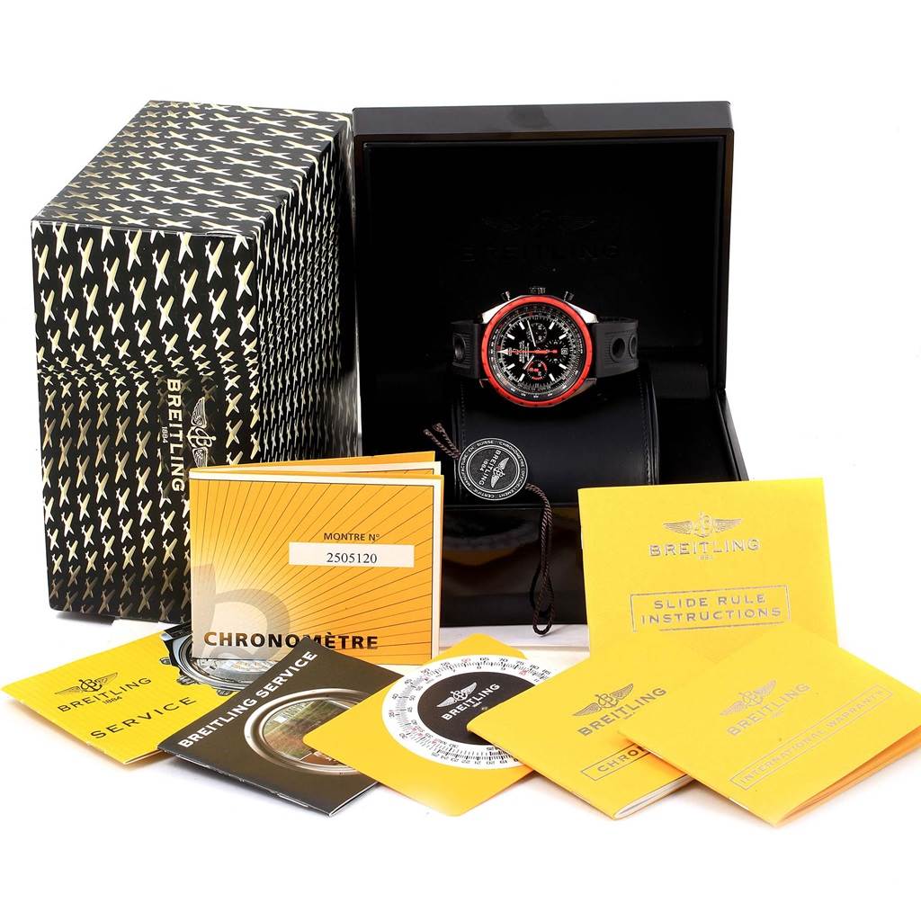 The image shows a Breitling Chronomatic M14360 Men's Stainless Steel Black Dial M14360 Men's Stainless Steel Black Dial watch and its packaging, including manuals and boxes, from a frontal angle.