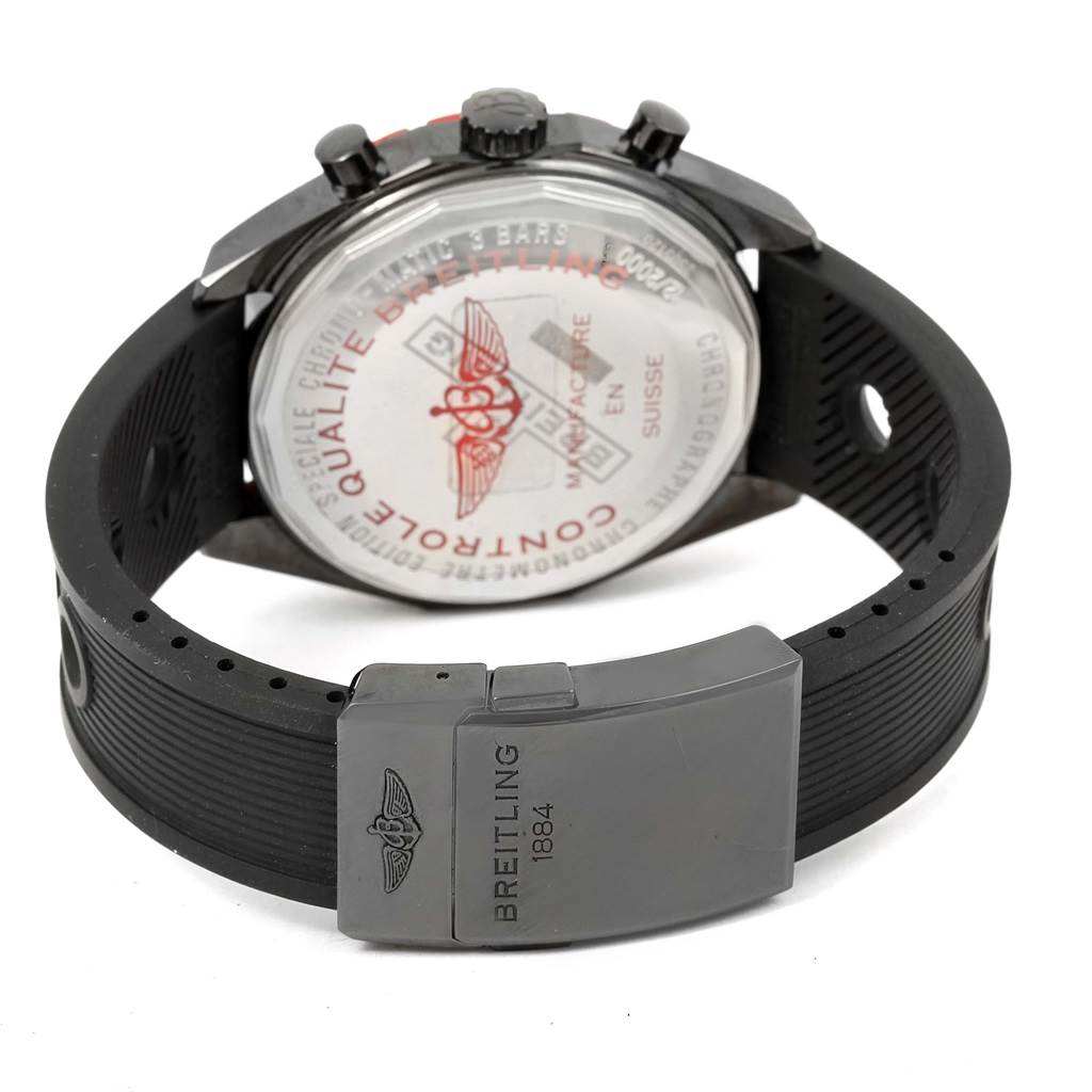 The image shows the back and clasp of a Breitling Chronomatic M14360 Men's Stainless Steel Black Dial M14360 Men's Stainless Steel Black Dial watch, highlighting the case back and a part of the rubber strap.