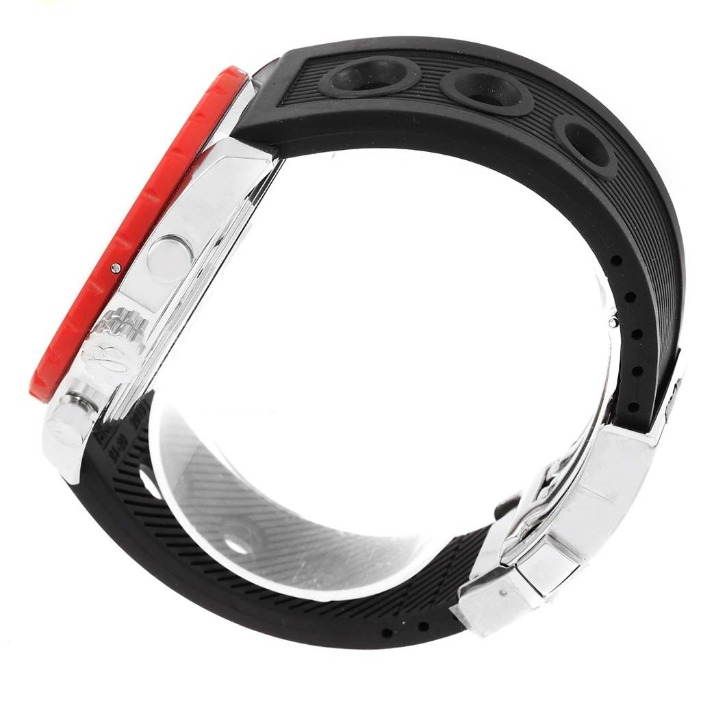The image shows a side view of the Breitling Chronomatic A19360 Men's Stainless Steel Black Dial A19360 Men's Stainless Steel Black Dial watch, highlighting its red bezel, crown, and black rubber strap.