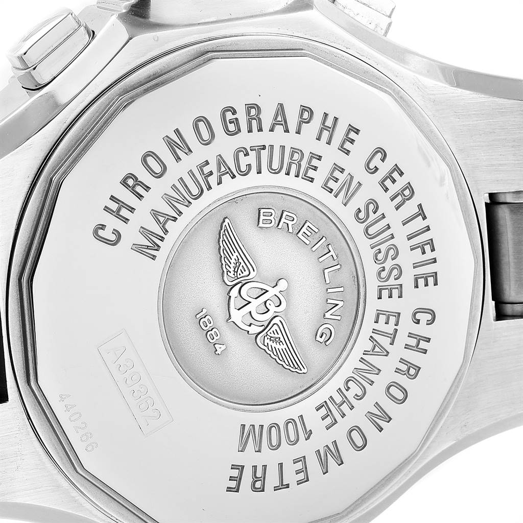 The image shows the case back of a Breitling Chronomatic A39362 Men's Stainless Steel Black Dial A39362 Men's Stainless Steel Black Dial watch with engraved certifications and the Breitling logo.