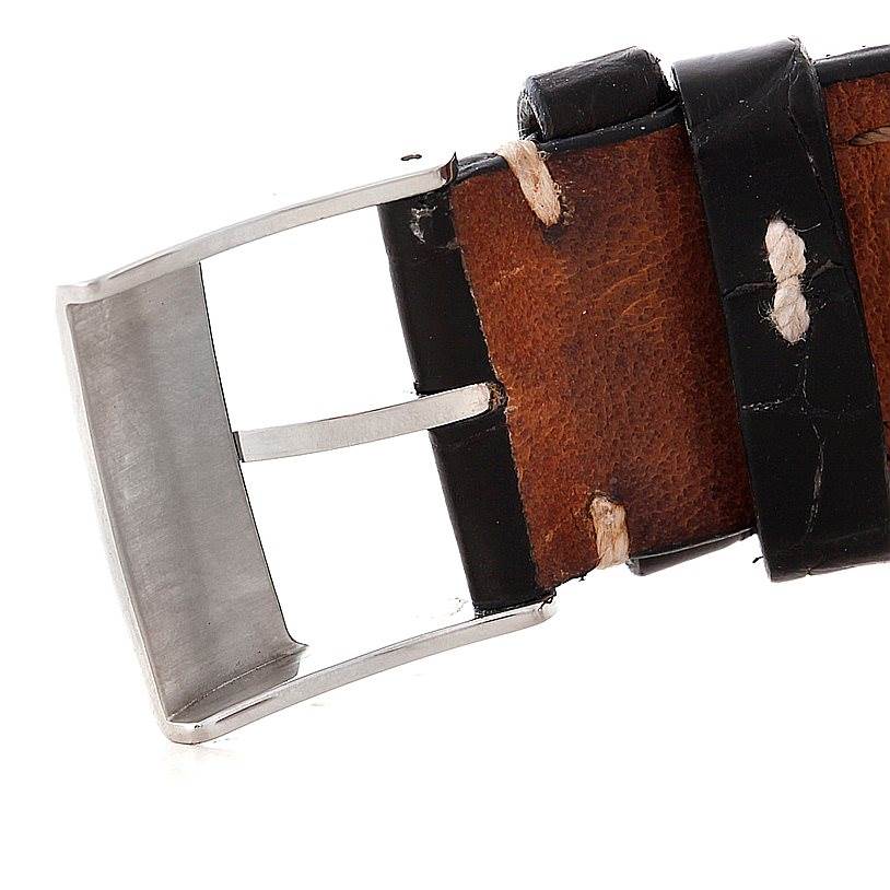 The image shows the buckle and part of the leather strap of a Breitling Chronomatic A22360 Men's Stainless Steel Black Dial A22360 Men's Stainless Steel Black Dial watch at a close-up angle.