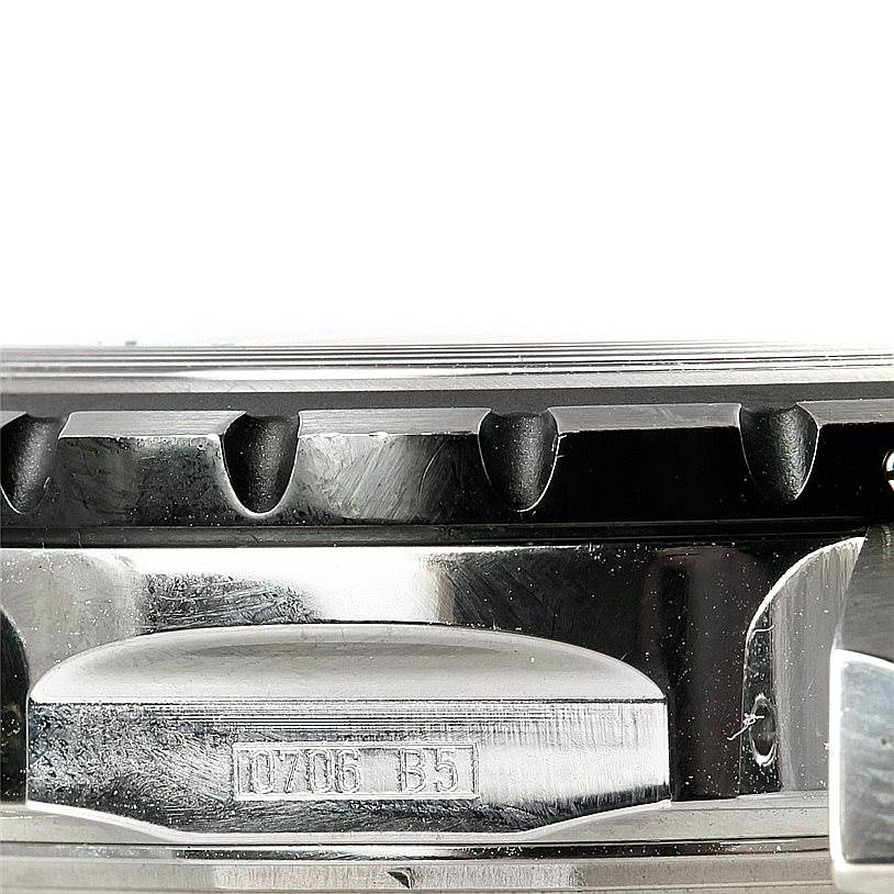 This image shows a close-up, side view of the bezel and side case of the Breitling Chronomatic A22360 Men's Stainless Steel Black Dial A22360 Men's Stainless Steel Black Dial watch.