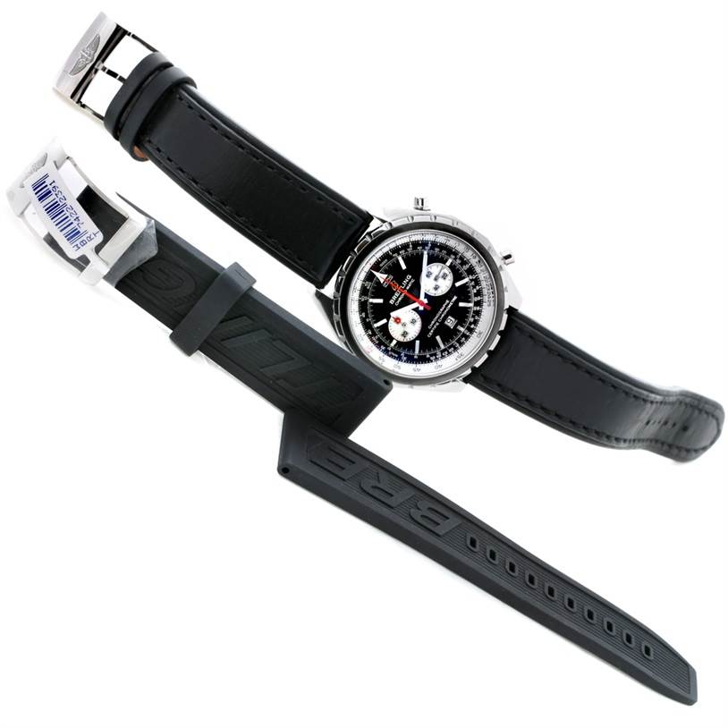 This image shows a Breitling Chronomatic A41360 Men's Stainless Steel Black Dial A41360 Men's Stainless Steel Black Dial watch and two interchangeable black straps, one leather and one rubber, angled diagonally.