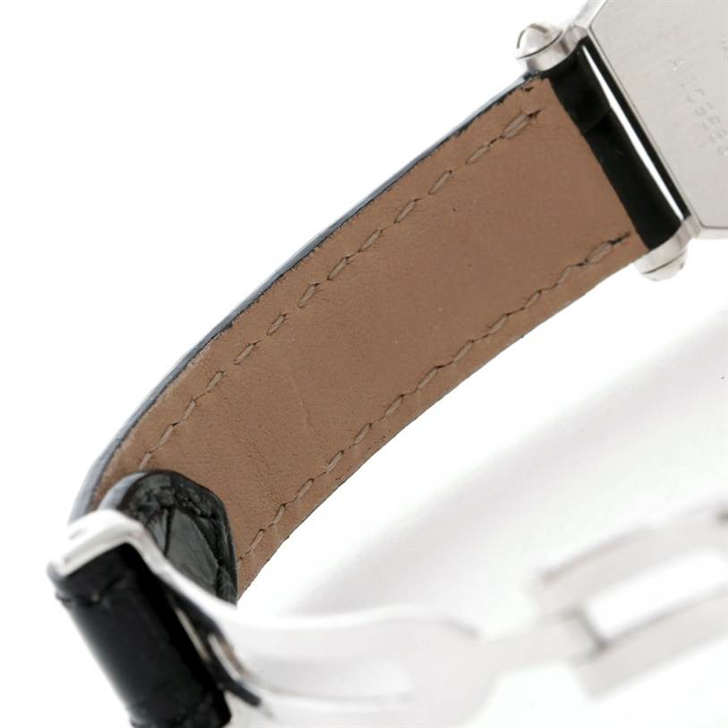 This close-up image shows the strap and buckle area of the Cartier Tonneau W1546351 Women's Platinum Silver Dial W1546351 Women's Platinum Silver Dial model watch.