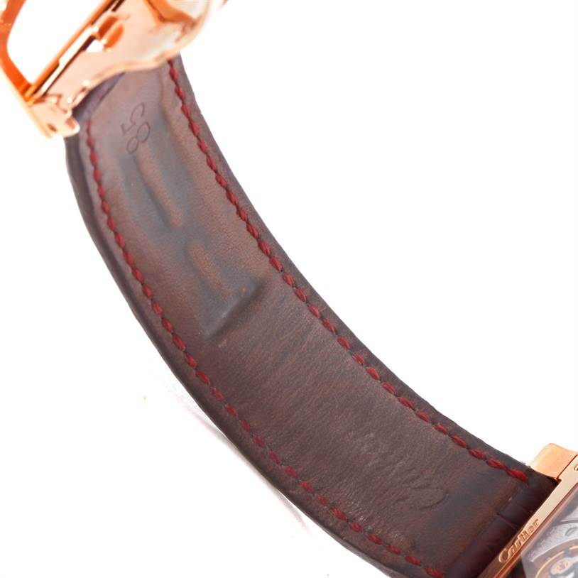 This image shows a close-up view of the leather strap and buckle of the Cartier Tank A Vis W1537651 Men's Rose Gold Silver Dial W1537651 Men's Rose Gold Silver Dial watch.