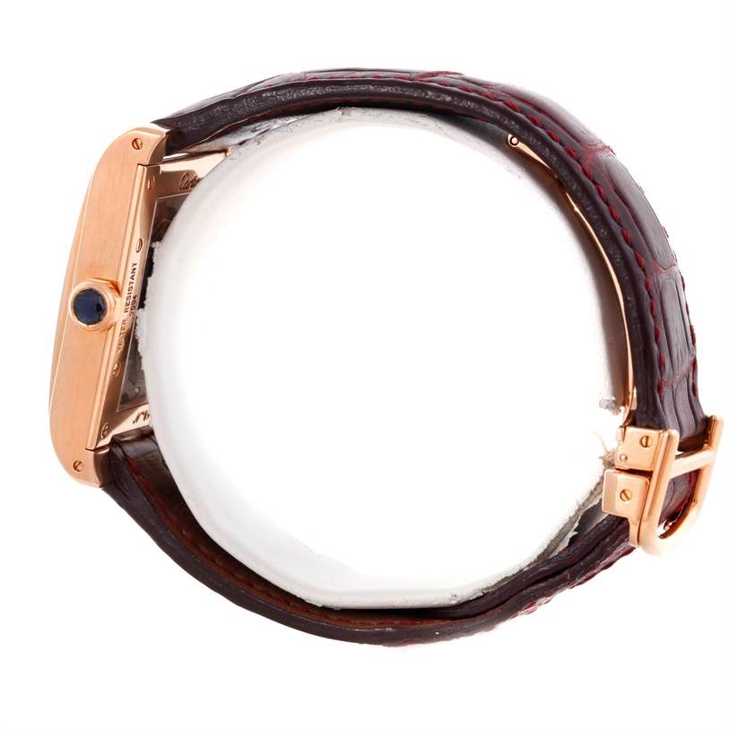 This image shows a side view of the Cartier Tank A Vis W1537651 Men's Rose Gold Silver Dial W1537651 Men's Rose Gold Silver Dial watch, highlighting the crown, case, and part of the leather strap.