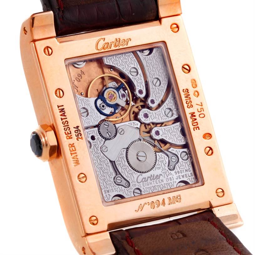 The image shows the back view of the Cartier Tank A Vis W1537651 Men's Rose Gold Silver Dial W1537651 Men's Rose Gold Silver Dial watch, highlighting the internal mechanical components.
