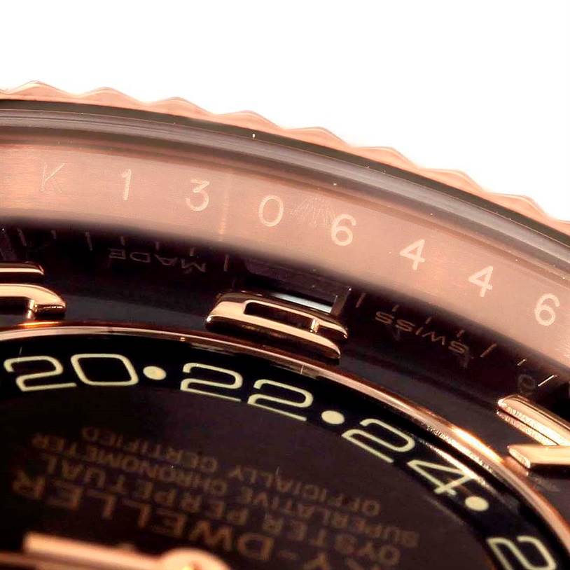 This close-up angle shows the bezel, part of the face, and the serial number of the Rolex Sky-Dweller 326135 Men
s Rose Gold Brown Dial 326135 Men
s Rose Gold Brown Dial watch.