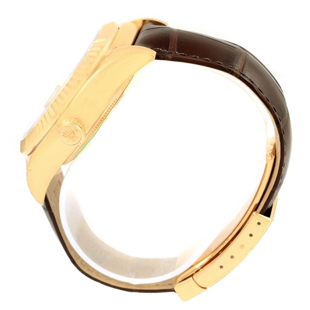 This image shows a side view of a Rolex Sky-Dweller 326138 Men's Yellow Gold Champagne Dial 326138 Men's Yellow Gold Champagne Dial watch, highlighting the crown, case, and leather strap.