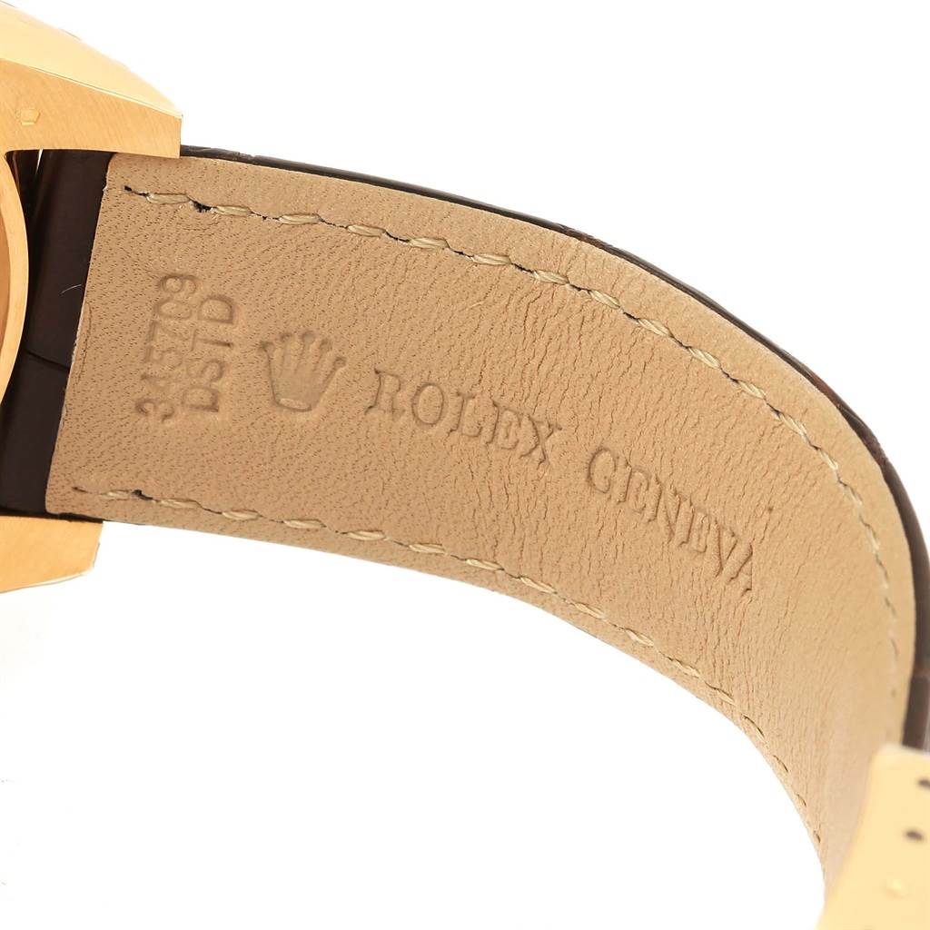 The image shows a close-up of the strap and part of the case of a Rolex Sky-Dweller 326138 Men's Yellow Gold Champagne Dial 326138 Men's Yellow Gold Champagne Dial watch.