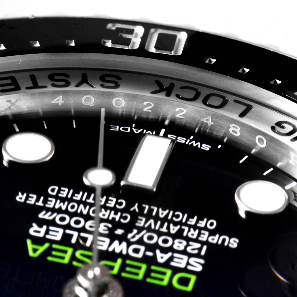 Close-up of the bezel, dial, and writing of the Rolex Sea-Dweller 116660 Men's Stainless Steel Blue Dial 116660 Men's Stainless Steel Blue Dial watch, displaying the model name and specifications.