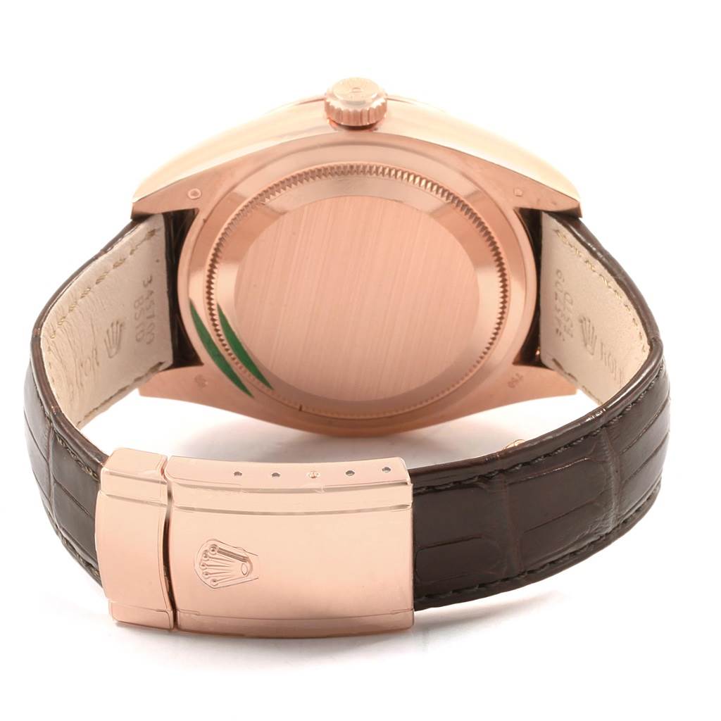 This image shows the back case and brown leather strap of the Rolex Sky-Dweller 326135 Men's Rose Gold Brown Dial 326135 Men's Rose Gold Brown Dial watch.