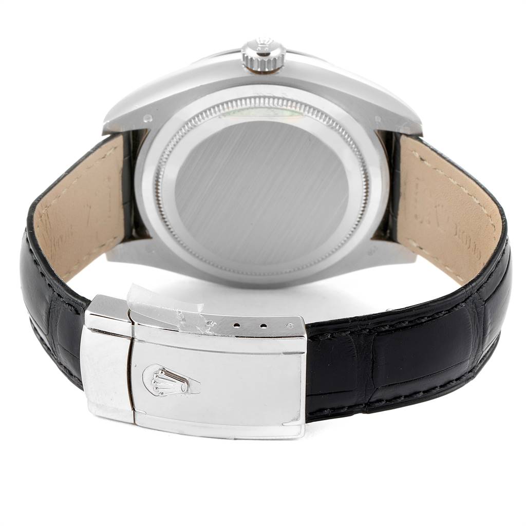 The image shows the back view of a Rolex Sky-Dweller 326139 Men's White Gold Black Dial 326139 Men's White Gold Black Dial watch, highlighting its leather strap and clasp.