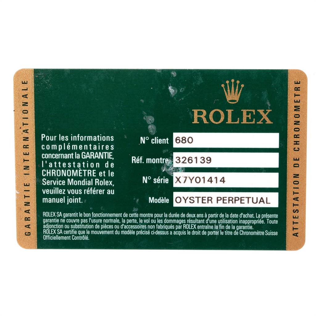 This image shows the warranty card for the Rolex Sky-Dweller 326139 Men's White Gold Black Dial 326139 Men's White Gold Black Dial model, detailing client, reference, and serial numbers.