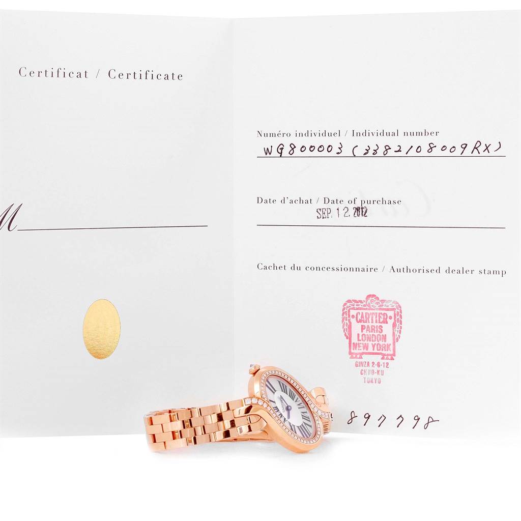 This image shows the Cartier Delices WG800003 Women's Rose Gold Silver Dial WG800003 Women's Rose Gold Silver Dial model watch with a rose gold bracelet and its certificate of authenticity.