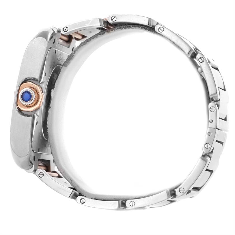 This image shows a side view of the Cartier Tank Anglaise W5310006 Men
s Steel and Gold (two tone) Silver Dial W5310006 Men
s Steel and Gold (two tone) Silver Dial watch, focusing on the crown and the bracelet links.