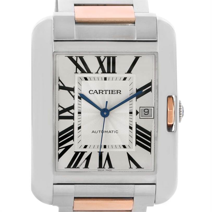The image shows a close-up front view of the Cartier Tank Anglaise W5310006 Men
s Steel and Gold (two tone) Silver Dial W5310006 Men
s Steel and Gold (two tone) Silver Dial watch face with a portion of the metallic strap.