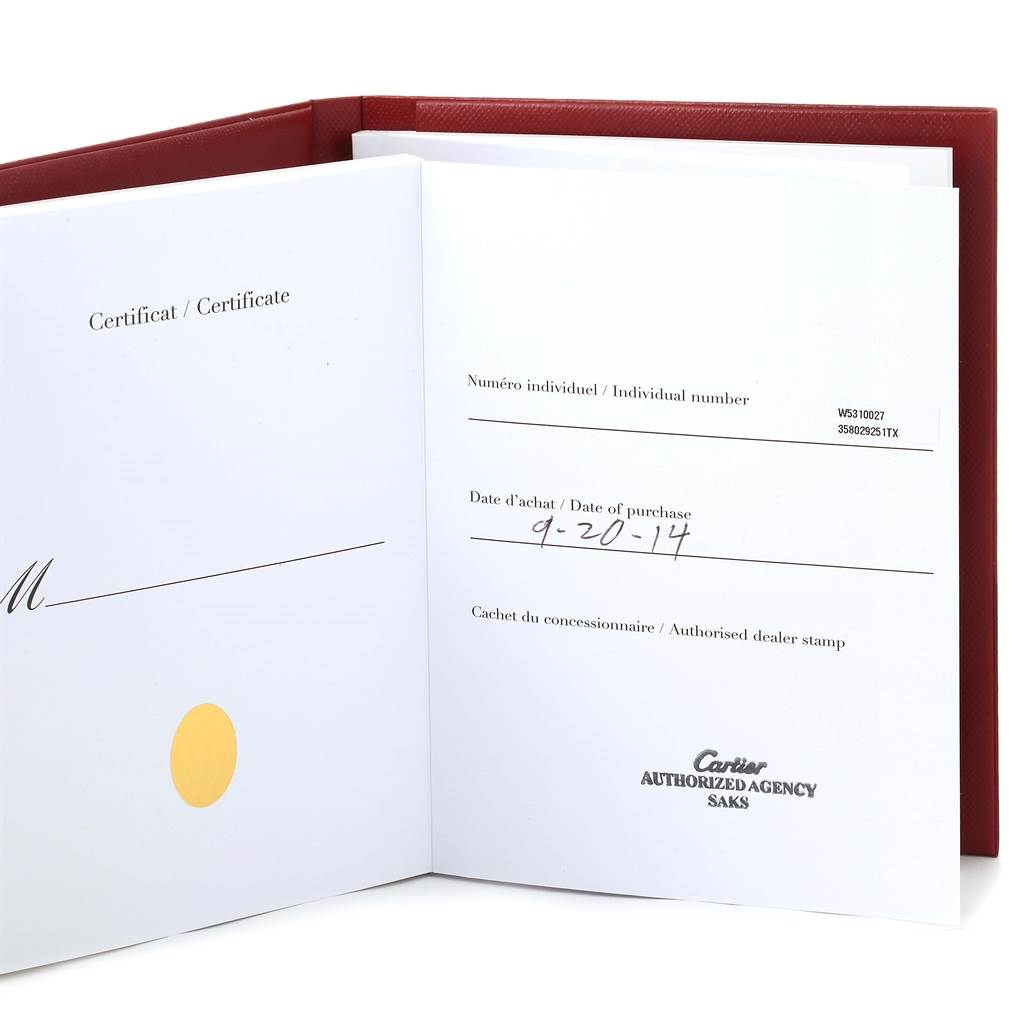 The image shows an open certificate booklet for the Cartier Tank Anglaise WT100024 Women
s Rose Gold Silver Dial WT100024 Women
s Rose Gold Silver Dial watch, displaying purchase details and dealer stamp.