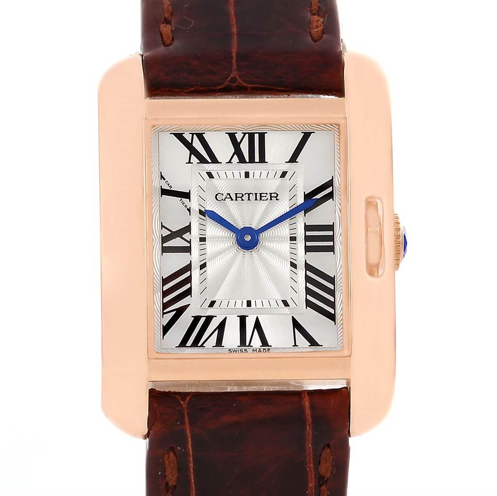 The image shows a front view of a Cartier Tank Anglaise WT100024 Women
s Rose Gold Silver Dial WT100024 Women
s Rose Gold Silver Dial watch, featuring its rectangular face, Roman numerals, and brown leather strap.