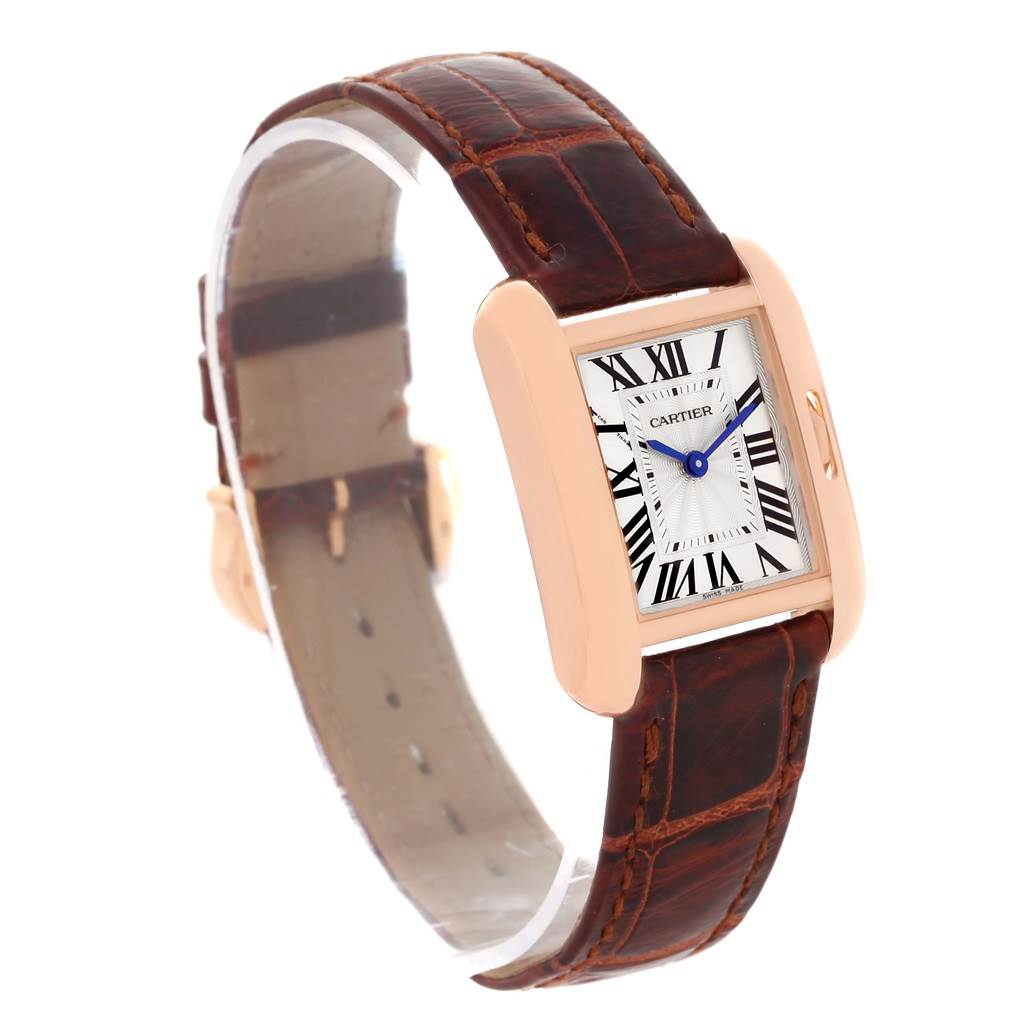 The image shows a Cartier Tank Anglaise WT100024 Women
s Rose Gold Silver Dial WT100024 Women
s Rose Gold Silver Dial watch at a three-quarter angle, highlighting its face, case, and leather strap.