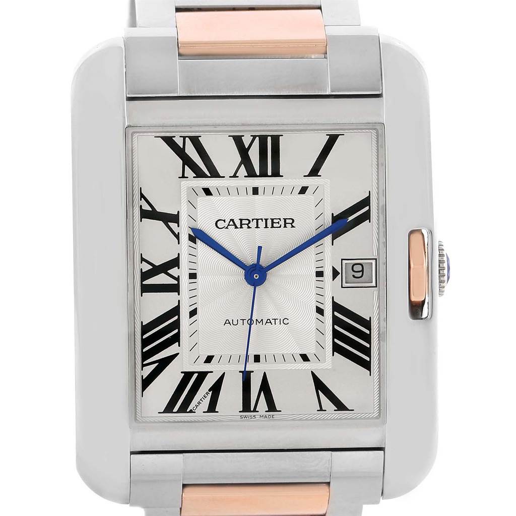 This image shows the face of the Cartier Tank Anglaise W5310006 Men's Steel and Gold (two tone) Silver Dial W5310006 Men's Steel and Gold (two tone) Silver Dial watch, highlighting its dial, Roman numerals, and date window.