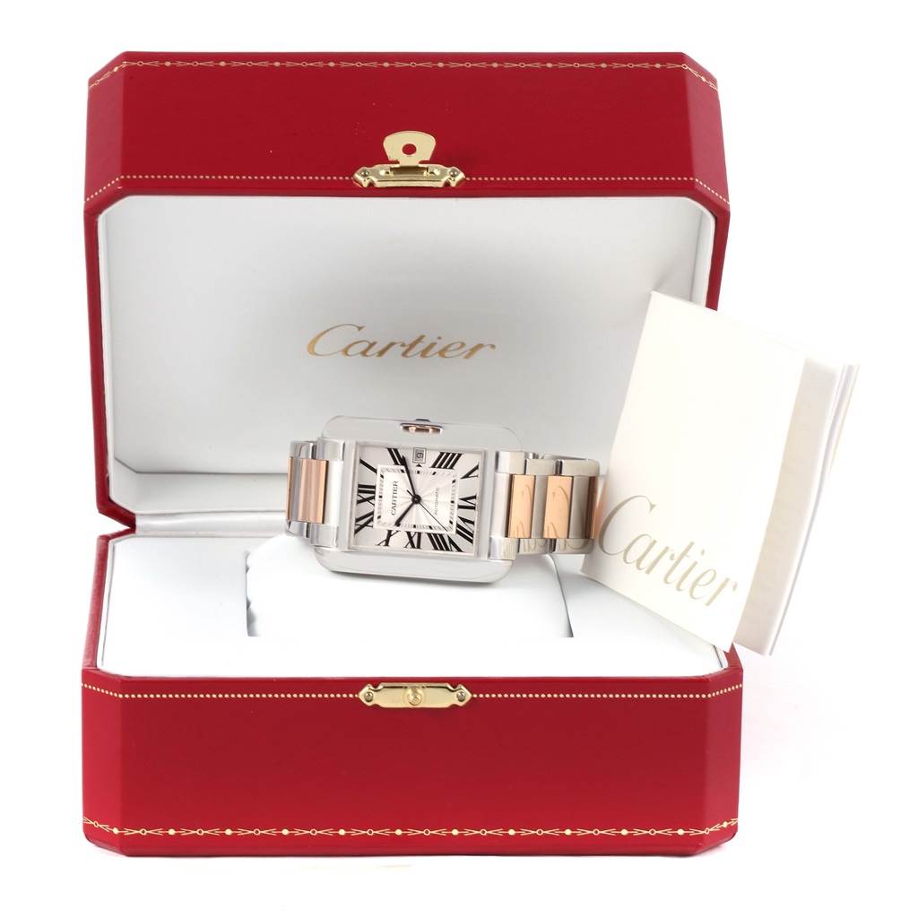 The Cartier Tank Anglaise W5310006 Men's Steel and Gold (two tone) Silver Dial W5310006 Men's Steel and Gold (two tone) Silver Dial watch is shown front-on in an open red Cartier box with an accompanying booklet.