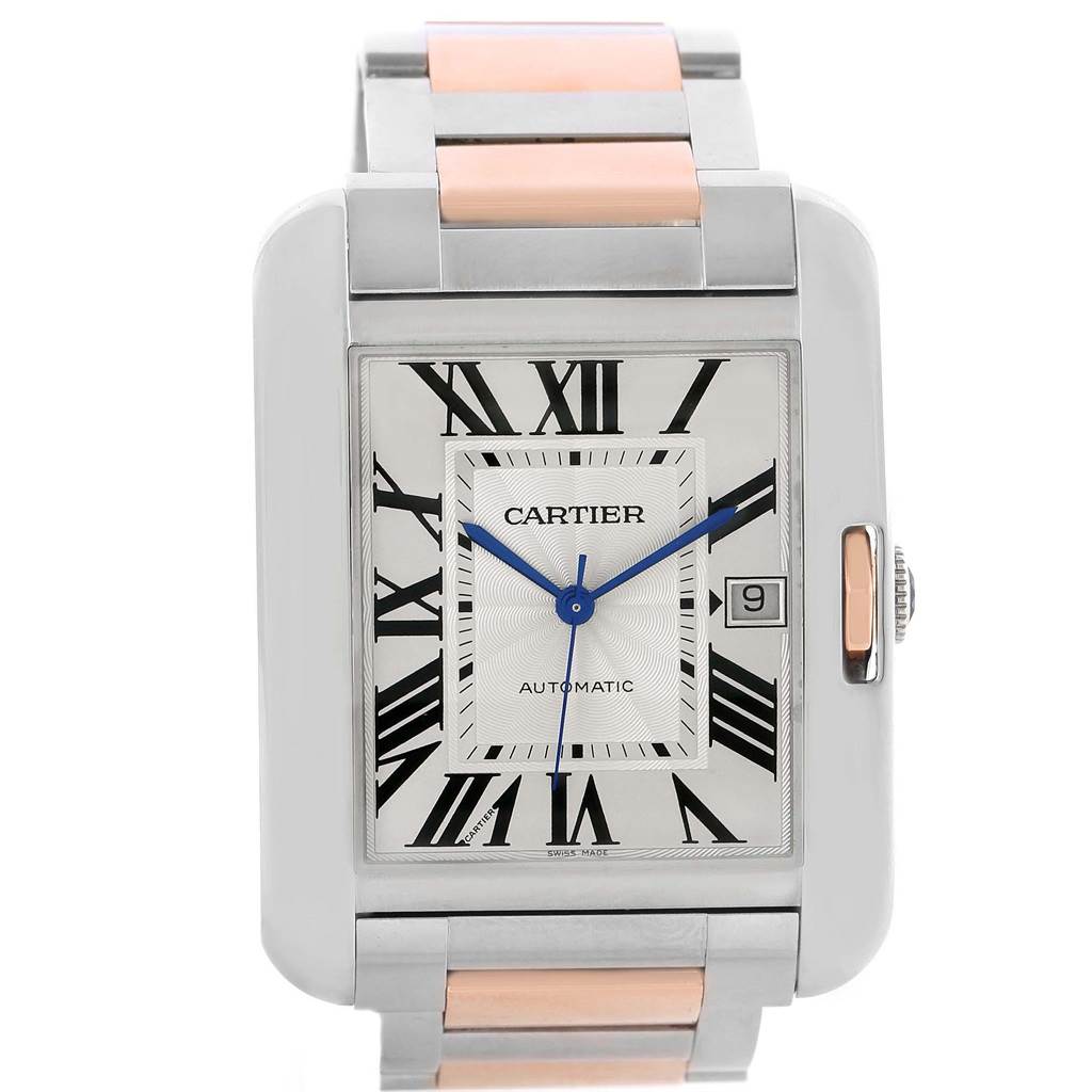 This is a front-facing view of a Cartier Tank Anglaise W5310006 Men's Steel and Gold (two tone) Silver Dial W5310006 Men's Steel and Gold (two tone) Silver Dial watch showing the dial, blue hands, Roman numerals, and part of the bracelet.