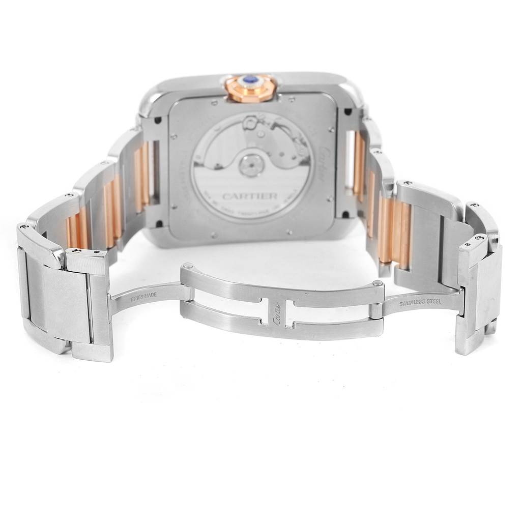 The image shows the backside and opened clasp of a Cartier Tank Anglaise W5310006 Men's Steel and Gold (two tone) Silver Dial W5310006 Men's Steel and Gold (two tone) Silver Dial watch, highlighting the bracelet and movement.