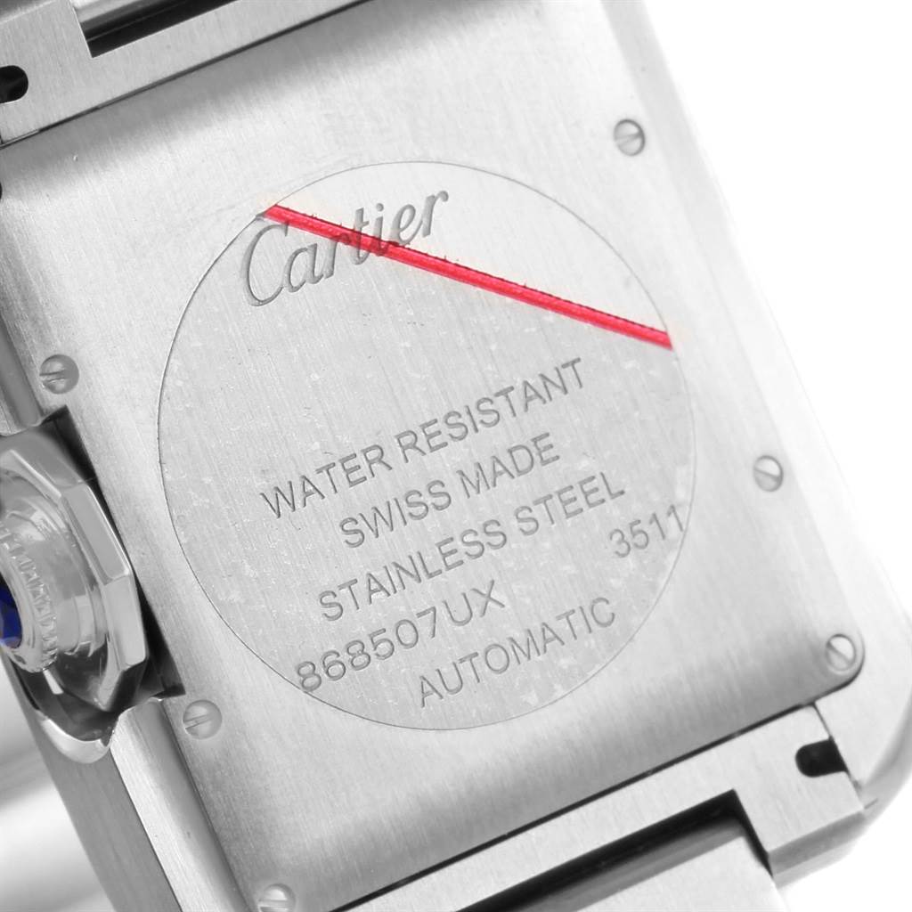 The image shows the back of a Cartier Tank Anglaise W5310009 Men's Stainless Steel Silver Dial W5310009 Men's Stainless Steel Silver Dial watch, highlighting its stainless steel case and water resistance details.