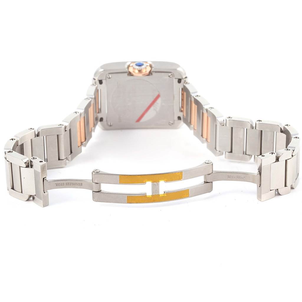The image shows the back and clasp of a Tank Anglaise watch by Cartier in a folded-open position, revealing parts of its metal bracelet.