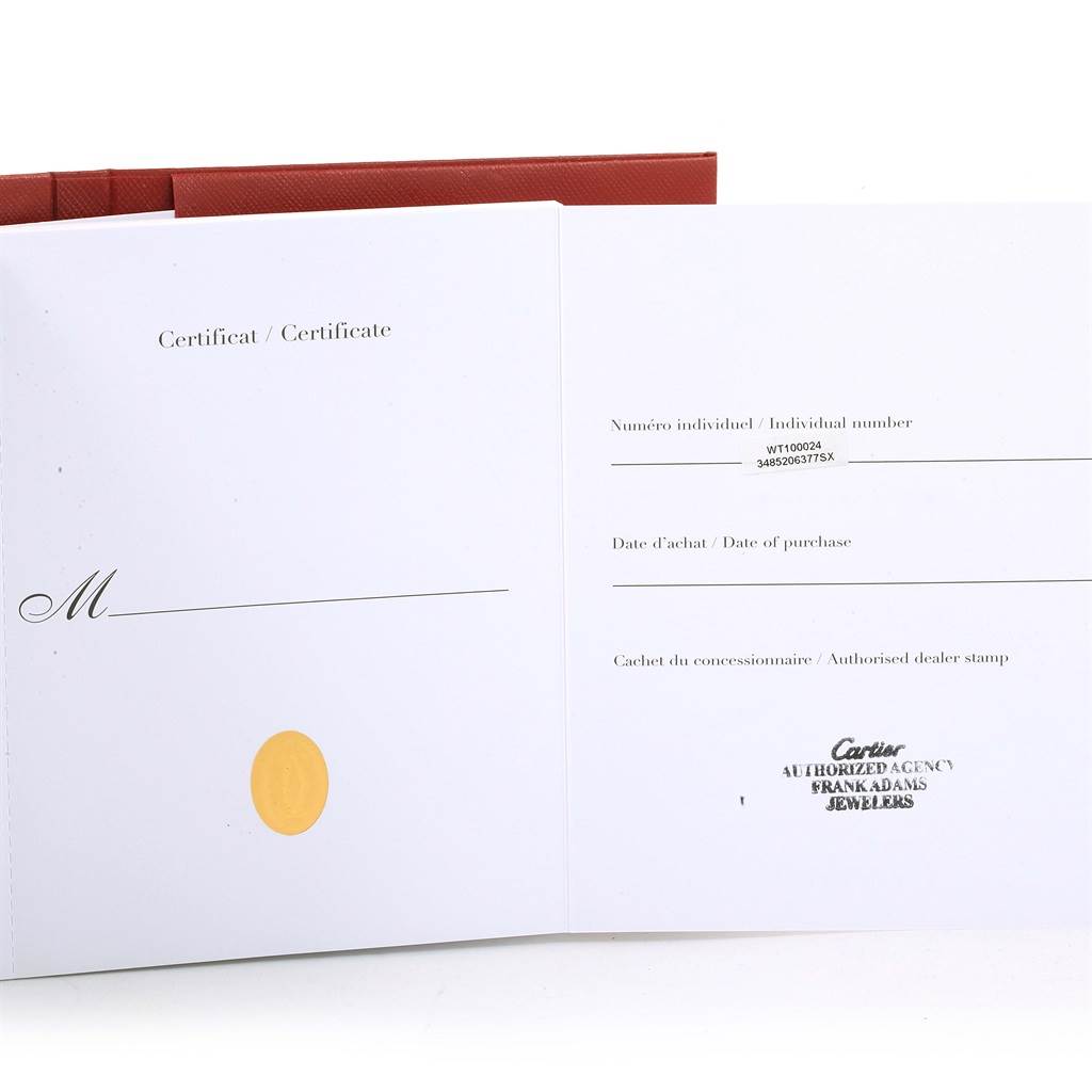 The image shows the certificate and warranty papers for the Cartier Tank Anglaise WT100024 Women's Steel and Gold (two tone) Silver Dial WT100024 Women's Steel and Gold (two tone) Silver Dial watch.