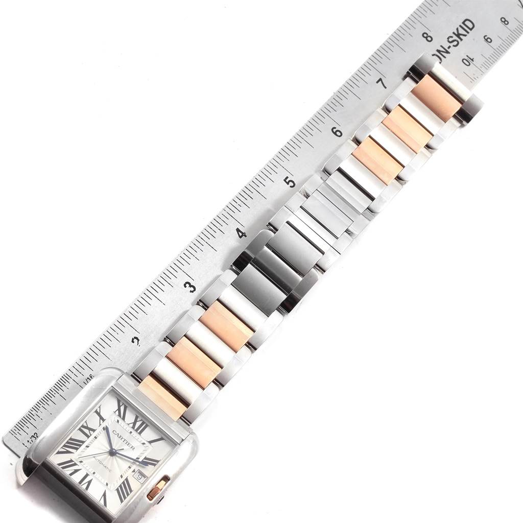 The image shows the face and band of a Cartier Tank Anglaise W5310006 Men's Steel and Gold (two tone) Silver Dial W5310006 Men's Steel and Gold (two tone) Silver Dial watch, measured with a ruler displaying its length.