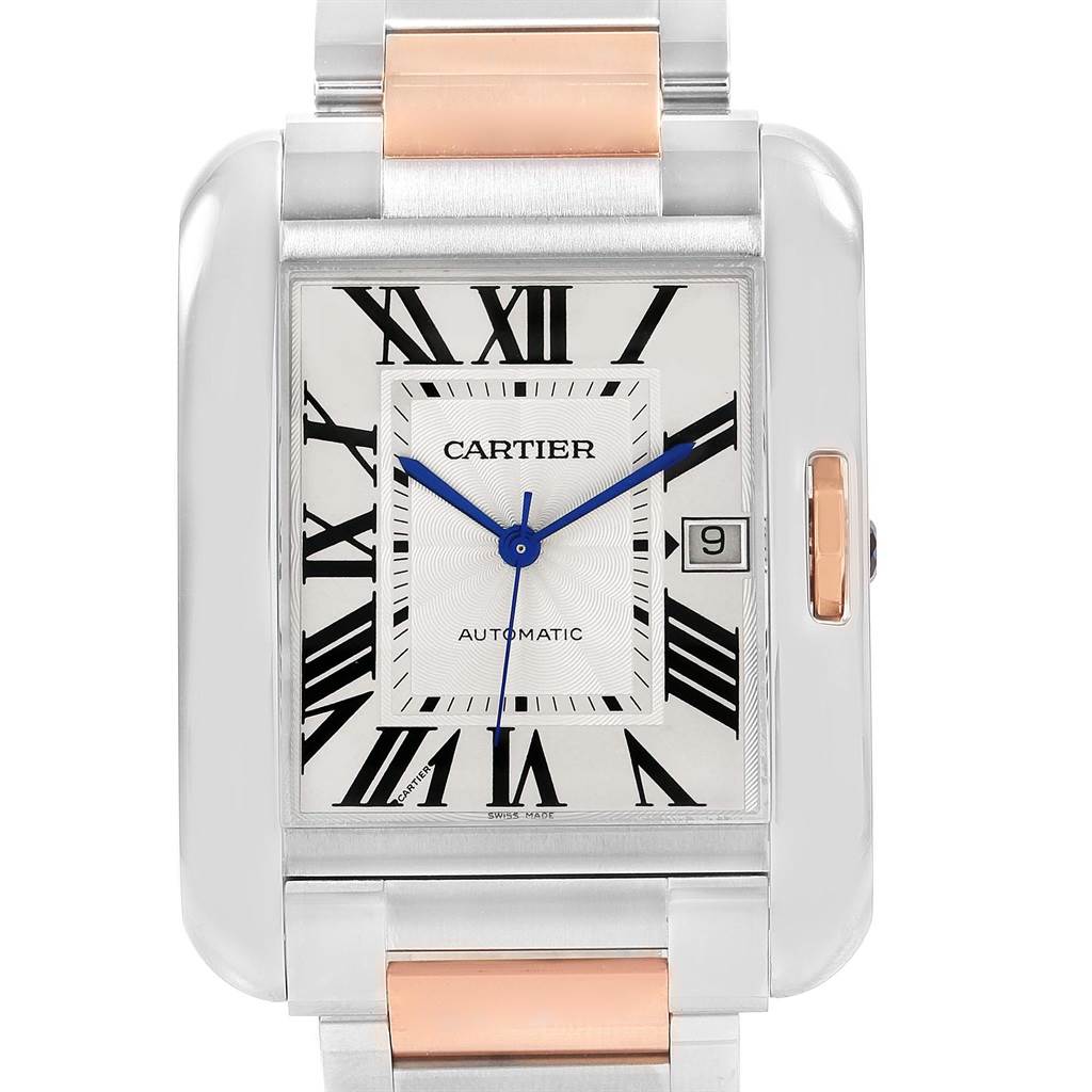 This is a close-up of the Cartier Tank Anglaise W5310006 Men's Steel and Gold (two tone) Silver Dial W5310006 Men's Steel and Gold (two tone) Silver Dial watch's face, showing its dial, hands, date display, and partial bracelet.