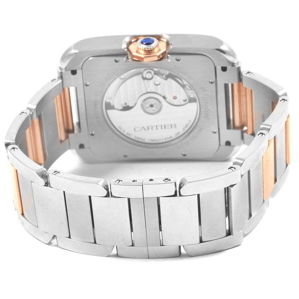 The image shows the back case and bracelet of the Cartier Tank Anglaise W5310006 Men's Steel and Gold (two tone) Silver Dial W5310006 Men's Steel and Gold (two tone) Silver Dial watch, highlighting its movement and two-tone design.