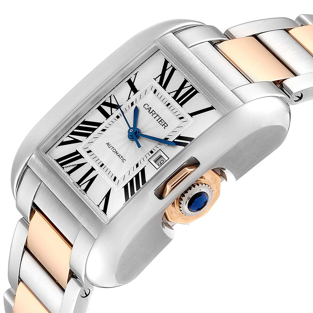 The image shows a Cartier Tank Anglaise W5310007 Men's Steel and Gold (two tone) Silver Dial W5310007 Men's Steel and Gold (two tone) Silver Dial watch at an angle emphasizing its face, crown, and two-tone bracelet.