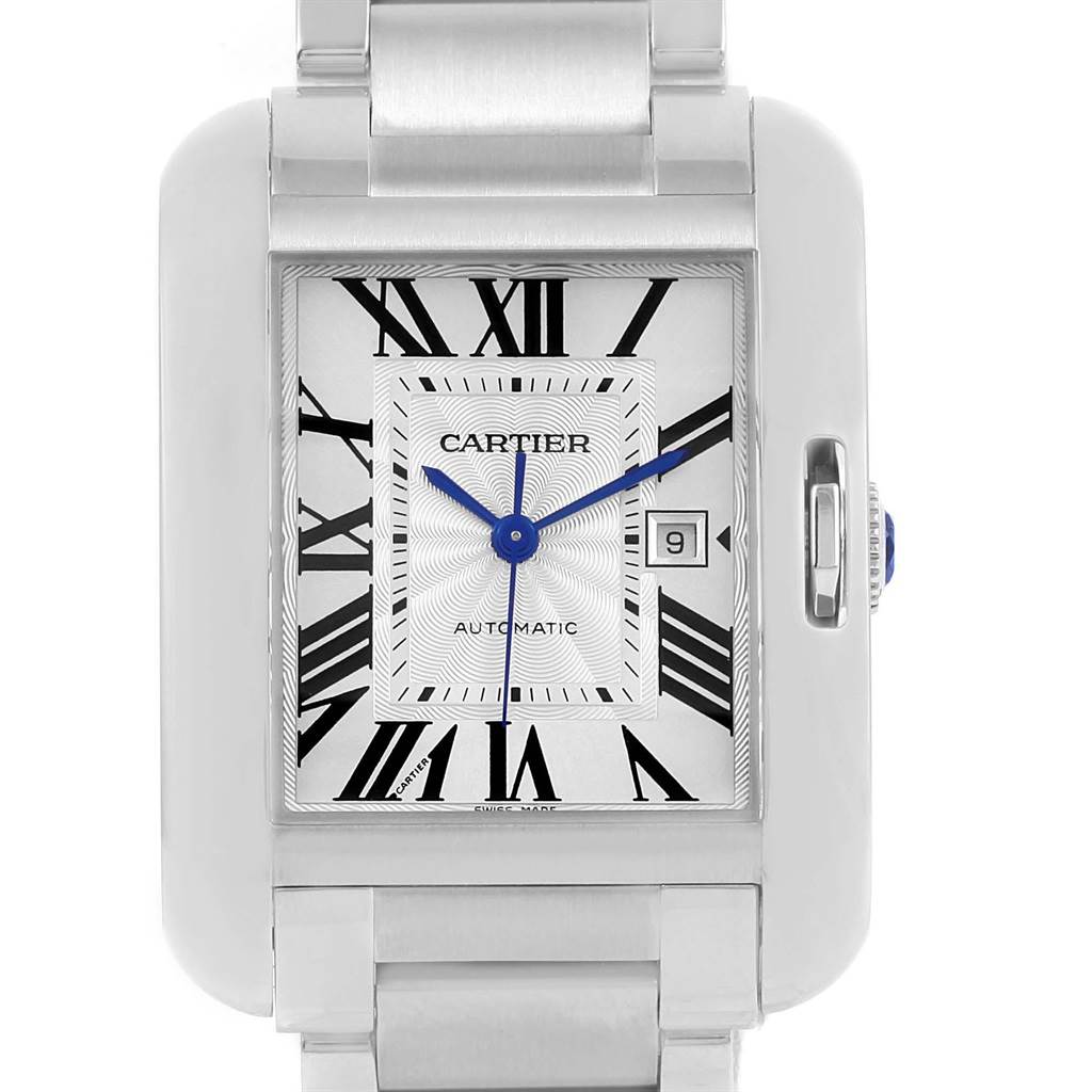 The image shows a front view of the Cartier Tank Anglaise W5310009 Men
s Stainless Steel Silver Dial W5310009 Men
s Stainless Steel Silver Dial watch, highlighting its face, Roman numerals, date window, and part of the bracelet.