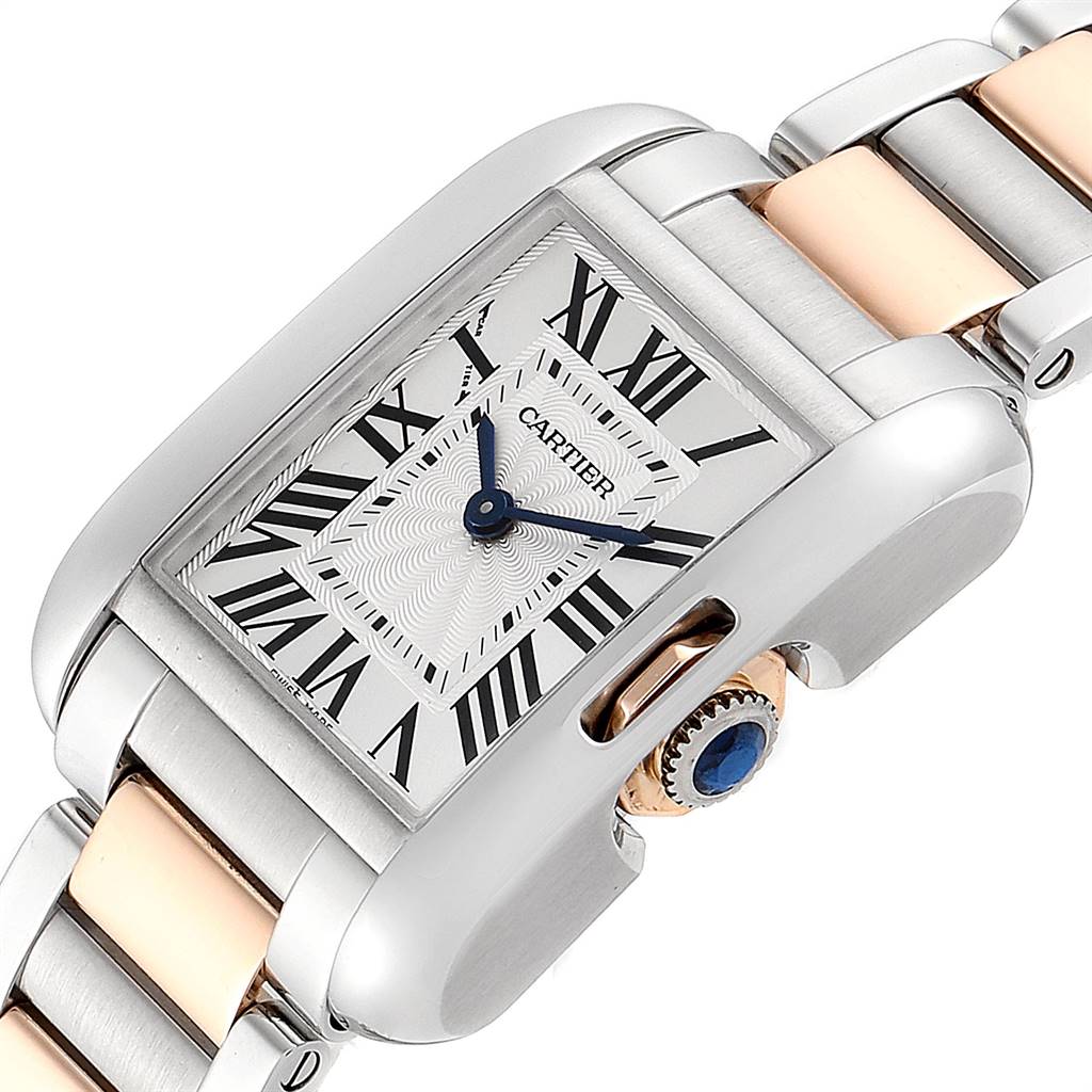 The image shows a Cartier Tank Anglaise W5310019 Women's Steel and Gold (two tone) Silver Dial W5310019 Women's Steel and Gold (two tone) Silver Dial watch angled to highlight the face, crown, and part of the bracelet.