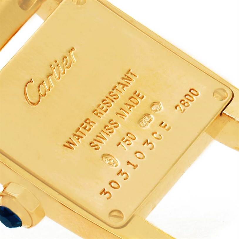 This image shows the backside of a Cartier Tankissime W650037H Women's Yellow Gold Silver Dial W650037H Women's Yellow Gold Silver Dial watch, highlighting the brand name and specifications.