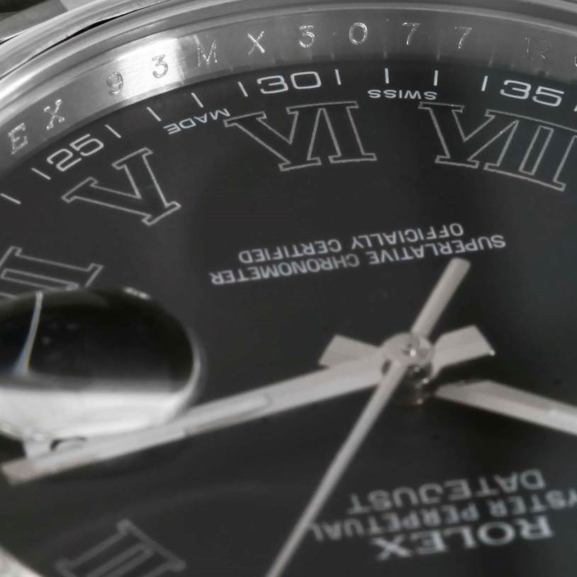 The image shows a close-up view of the dial and bezel of a Rolex Datejust 41 116300 Men's Stainless Steel Black Dial 116300 Men's Stainless Steel Black Dial watch, highlighting the Roman numerals and hands.